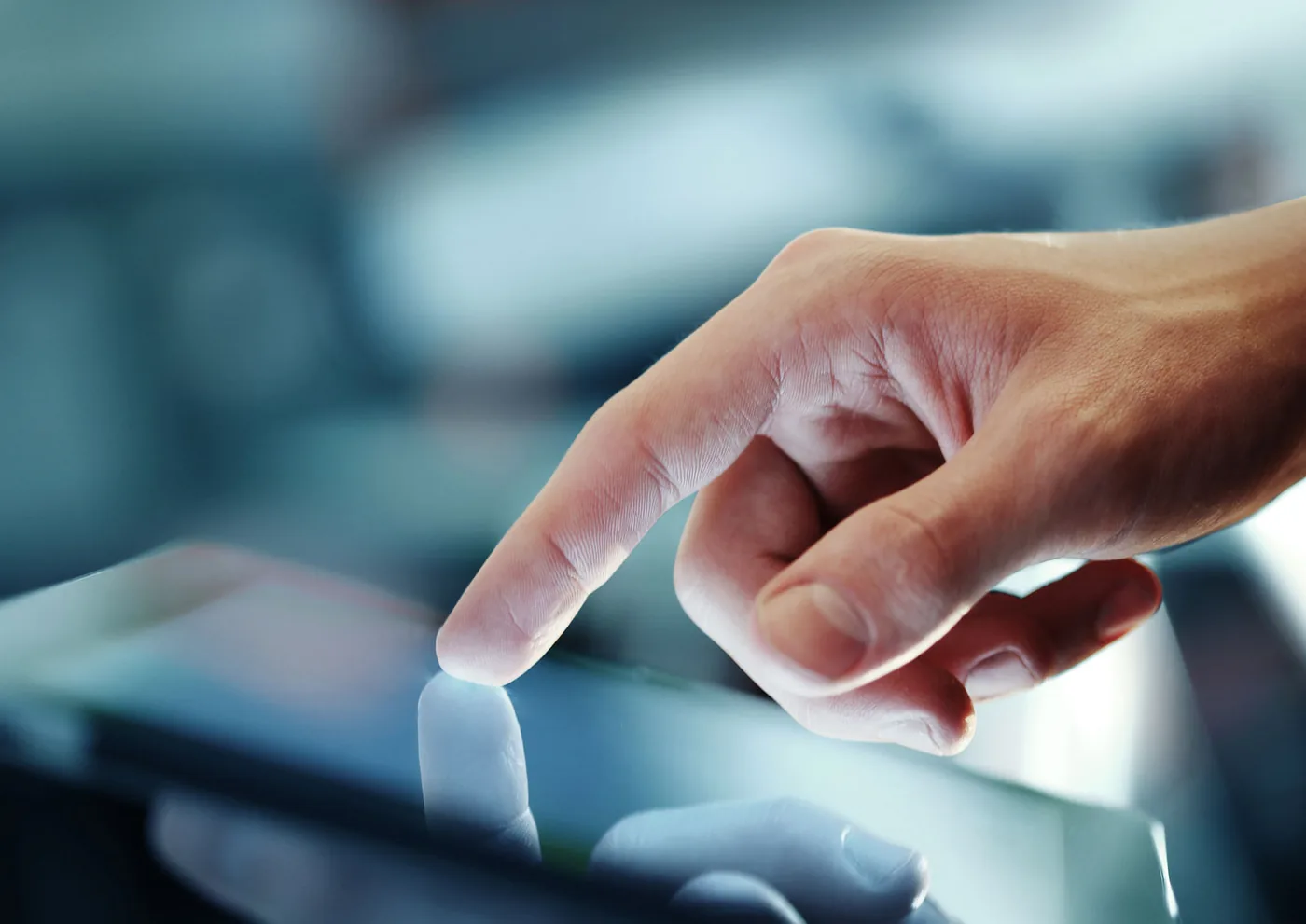 Website design being reviewed on a phone and laptop